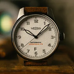 Weiss Automatic Standard Issue Field 42mm limited edition, textured white dial with orange Nashville, TN signature, on tan suede strap