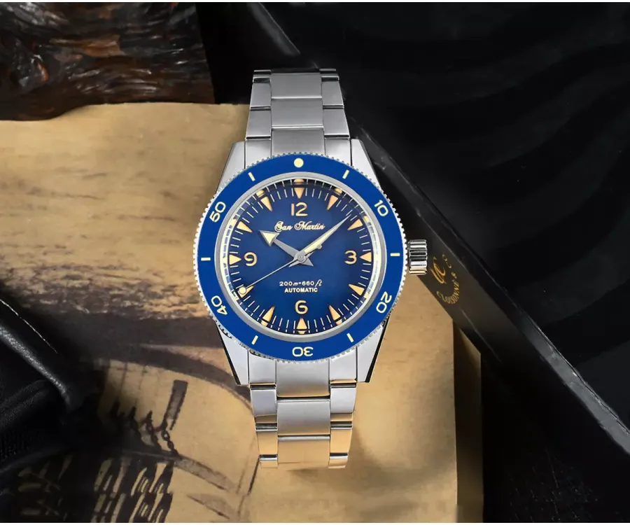 San Martin SN051-G with matte blue sandwich dial and blue ceramic bezel on steel bracelet