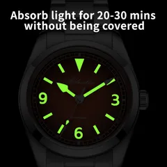 Addiesdive AD2554 lume shot, with green-glowing numerals, markers and hands
