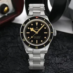Thorn SHY028 on the riveted steel bracelet, photographed on a dark background