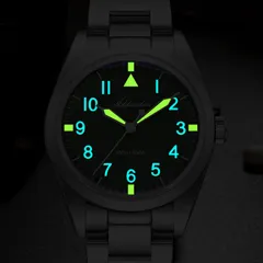 Addiesdive AD2502 lume shot, with green- and blue-glowing numerals and green-glowing hands