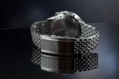 Screw back and signed clasp of the Precista PRS-45 Aerotimer on the beads-of-rice bracelet