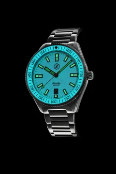 Zelos Blacktip 200m Diver Frost lume shot, dial and bezel glowing blue