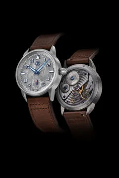 Zelos Skyraider in titanium, meteorite dial, front and display back, on brown leather strap