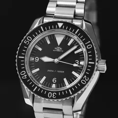 MKII Project 300 Big-T Non-date on its bracelet