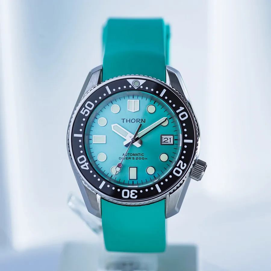 Thorn SHY019 Marine 200 Master with turquoise dial, date at 3 and black bezel on a turquoise rubber strap