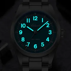 Addiesdive AD2521 lume shot, with blue-glowing numerals and hands