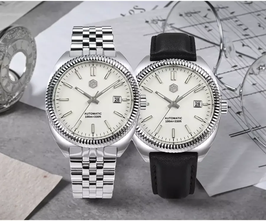 San Martin SN069-G with white dial and fluted bezel, on bracelet and on leather strap