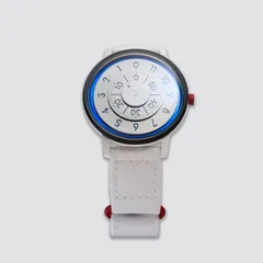 NASA-themed Anicorn 60th Anniversary edition in white Cerakote with blue and silver discs on a white textile strap