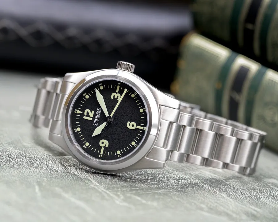 Cincinnati Watch Company P-40 A-11 Pilot, black grained dial with pilot numerals, on steel bracelet