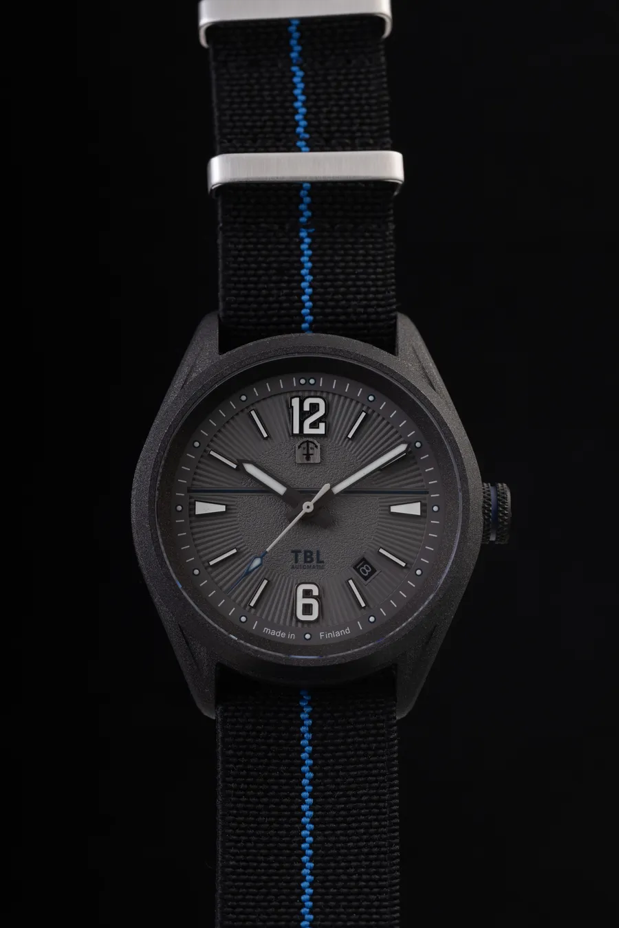 Pook TBL Thin Blue Line with grey dial and dark grey ceramic-coated case on a black strap with a blue stripe