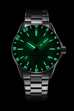 Zelos Spearfish GMT Frost lume shot, light blue lume glowing green