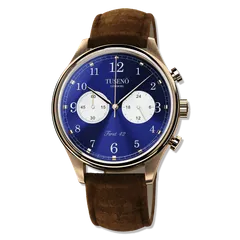 Tusenö First 42 Panda, rose gold case, blue reverse-panda dial, on brown suede strap