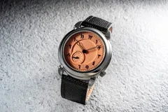 Feynman One Burtuqal, orange guilloché dial with Eastern Arabic numerals