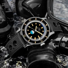 Thorn T007 titanium case and humidity indicator dial at an angle on a perforated rubber strap