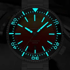 Addiesdive AD2526 in the dark, hands, indices and the full bezel scale glowing blue