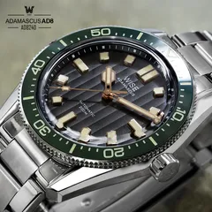 Wise Adamascus AD8240 close-up of the striped dial, rose gold hands and dark green ceramic bezel