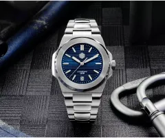 San Martin SN0076G with blue striped dial and date on integrated bracelet