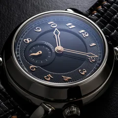 Feynman One Galaxy Onyx, black onyx centre with guilloché outer dial and rose-gold numerals