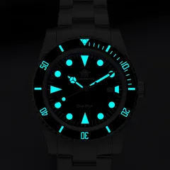 Addiesdive AD2068 lume shot, with blue-glowing dial markers, hands and bezel scale