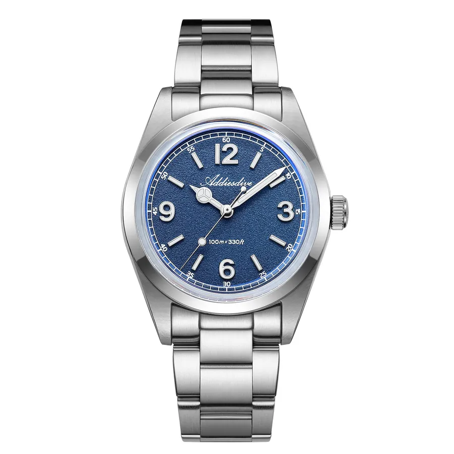 Addiesdive AD2518 with blue textured dial, 12-3-6-9 numerals and Mercedes hour hand on a three-link bracelet