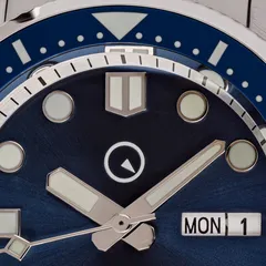 Close-up of the Islander Help Me Build This First Edition dial with day-date window at 3
