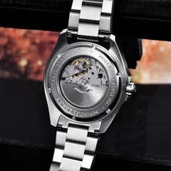 Pagani Design PD-YS034 screw-down display caseback engraved PD-YS034 and 100M, showing a Miyota movement with rotor marked Twenty-one 21 jewels, CWMJ Japan