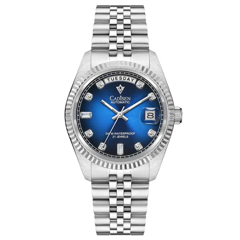 Cadisen C8229 day-date automatic with blue gradient dial, stone-set markers, fluted bezel, day at 12 and magnified date at 3 on a steel jubilee bracelet