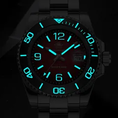 Addiesdive AD2513 red version in the dark, hands, markers and the full bezel scale glowing blue