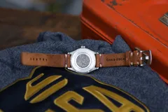 Oak & Oscar Humboldt Team Shuster Edition, caseback set with a disc of Olympic curling stone