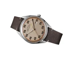 ELKA X02-0802, khaki beige dial with black numerals, orange lumed track and date at 3, on brown cut-edge leather