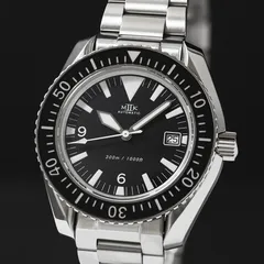 MKII Project 300 Big-T Date on its bracelet