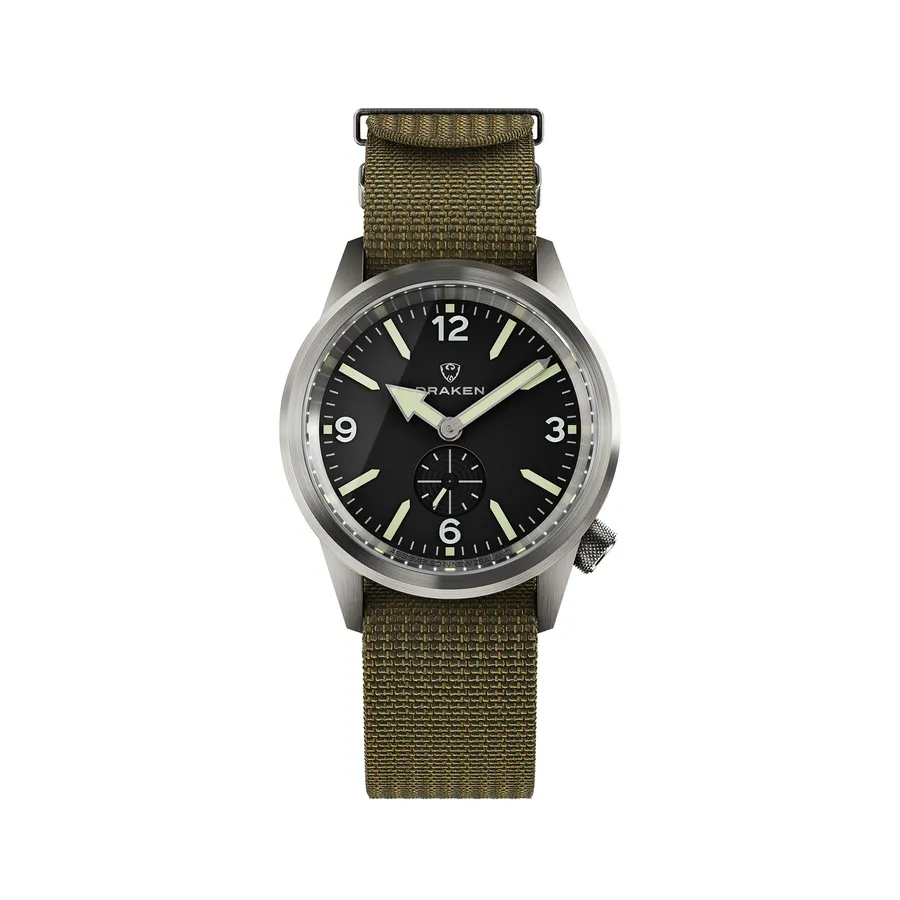 Draken Aoraki Vector with arrow hands and Arabic numerals at 3, 6, 9 and 12 on an olive nylon strap