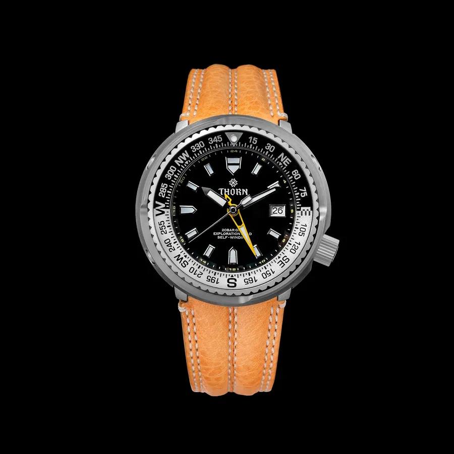 Thorn T012 titanium shrouded GMT diver with black dial, yellow GMT hand and two-tone compass bezel on a tan leather strap