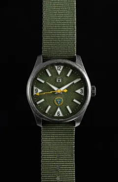 Pook Osasto Törni with textured green dial on a green nylon strap