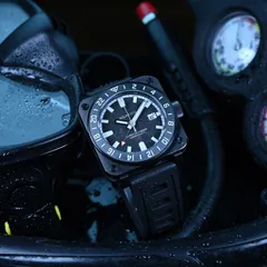 Aquatico Super Charger GMT DLC with black carbon dial, on black rubber strap