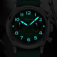 Addiesdive AD2516 lume shot of the green dial, with blue-glowing numerals and hands