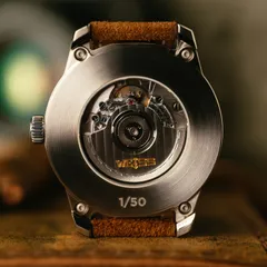 Weiss Automatic Standard Issue Field 42mm, Caliber 2130 through the display caseback held by four screws