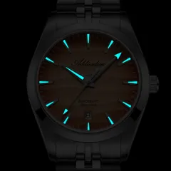 Addiesdive AD2540 lume shot, with blue-glowing hands and hour markers