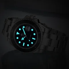 Addiesdive H3C in the dark, dial markers and hands glowing blue