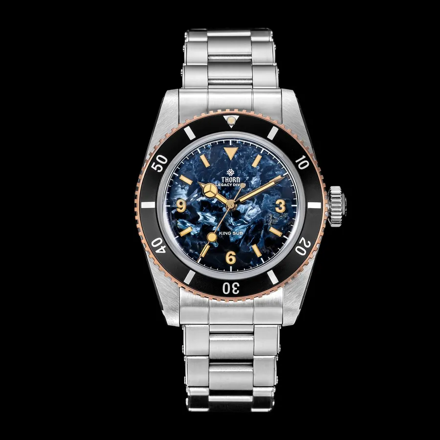 Thorn T027 with blue natural Pietersite stone dial, black bezel insert and bronze bezel on a steel bracelet