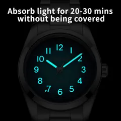 Addiesdive AD2553 lume shot of the blue dial, with blue-glowing numerals and hands