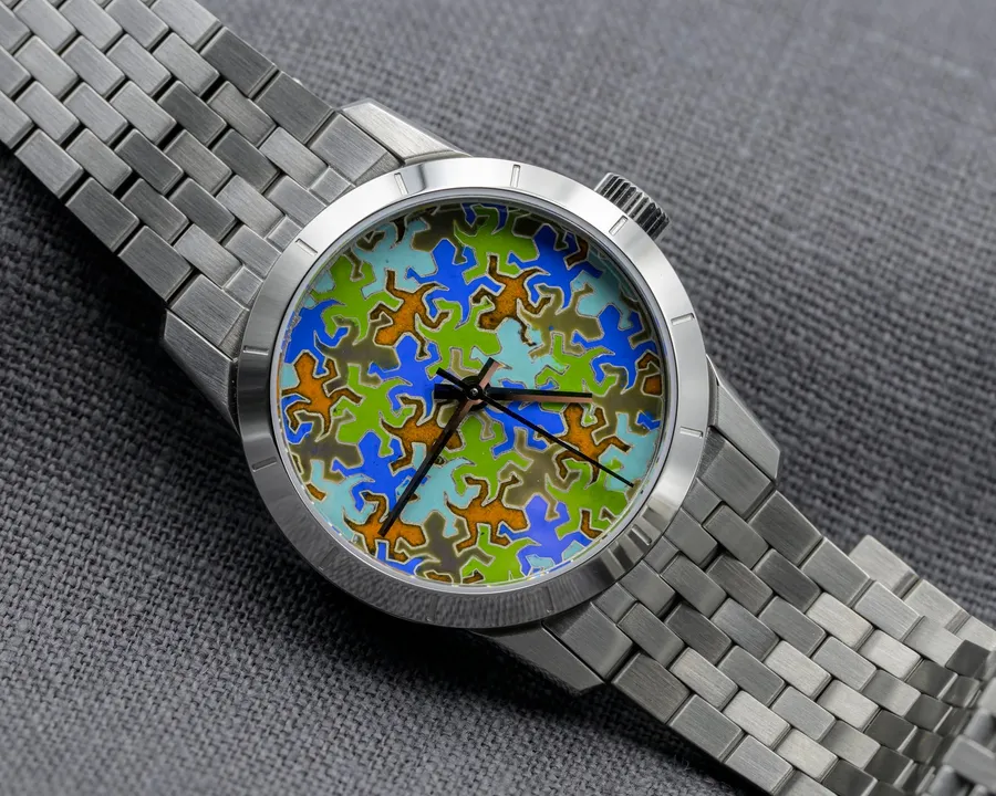 Cincinnati Watch Company Lazarus Lizard, tessellated lizard pattern in earth-tone enamel, on a seven-link steel bracelet