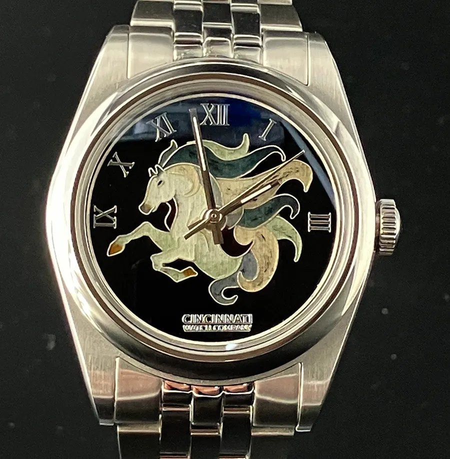 Cincinnati Watch Company Silver Beauty, cloisonné enamel silver horse on a black enamel dial with Roman numerals, on a five-link bracelet