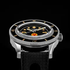 Thorn T009 titanium case with domed crystal and lumed bezel seen from the side