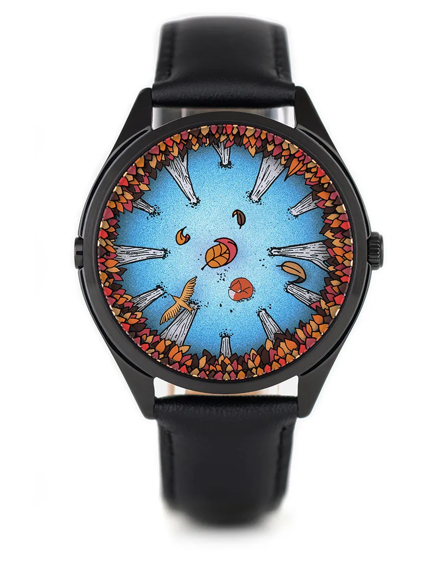 Mr Jones A Perfectly Useless Morning, sky-blue dial ringed with trees, a falling leaf and a circling bird, black case on black leather, front view