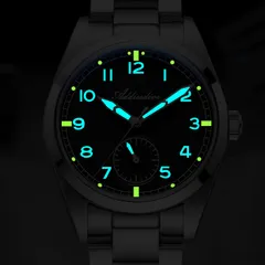 Addiesdive AD2099 lume shot, blue-glowing numerals and hands with green-glowing markers