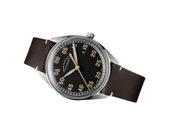 ELKA X01-0801, black dial with "old tritium" lume numerals and date at 3, on dark brown cut-edge leather