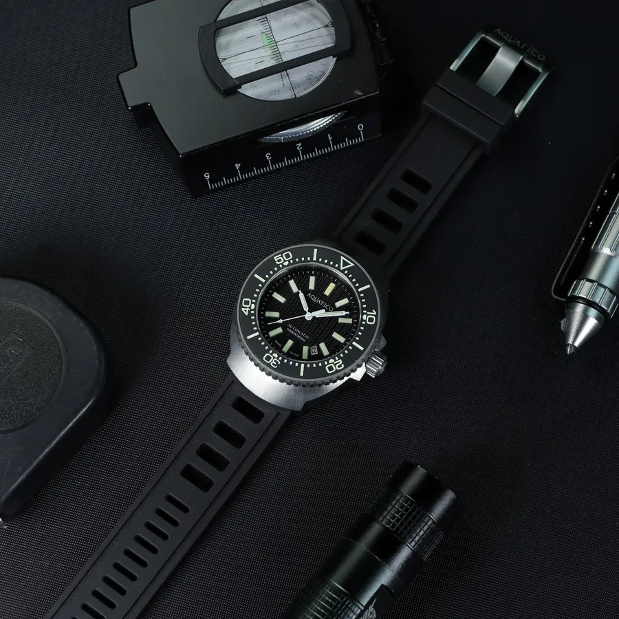 Aquatico Super Marine Tritium, titanium diver with black tritium dial and black ceramic bezel, on black rubber strap