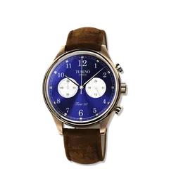 Tusenö First 38 Panda, rose gold case, blue reverse-panda dial, on brown suede strap